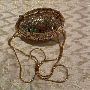 Judith Leiber gold jeweled egg with mirror